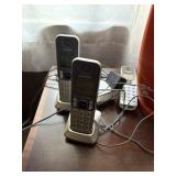 panasonic set of portable phones,  den