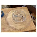 2 glass pieces both with candle wicked borders