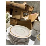 12 Mugs, 7 Saucers, and 7 green melamine plates