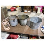 3 Galvanized pails and rusty lamp