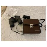 pair of binoculars, 00 BUSHNELL in leather case