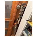 tools on wall, pencil sharpener,saws, power