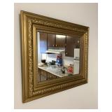 framed mirror gold colored 25.5' x 30'