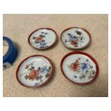 4 oriental plates 3' wide , dining room