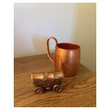 copper mug and metal conestoga wagon