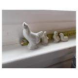 set of tiny white ceramic hen and 3 peeps
