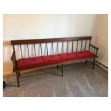 WOOD BENCH with red seat pad, 7ft long