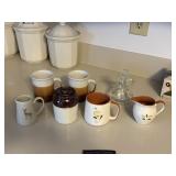 3 mugs, 2 creamers, vinegar decanter, small