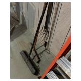 pitch fork and 2 push brooms  garage