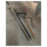 2 long handled cultivators, and 2 corn choppers