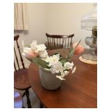 small crock with faux flowers   dining room