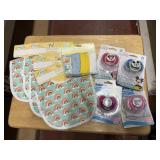 4 Baby bibs, 4pk washcloths, and 4 pacifiers