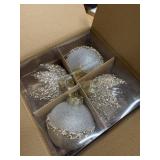 4 large gold shimmer christmas ornaments.