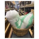 Basket w/ 3 bags of pillow stuffing
