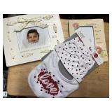 2 picture frames, hat and baby bib