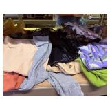 large box of womens medium to large clothes
