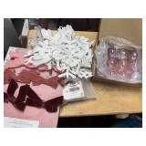 set of pink ornaments, pink bows, snowflakes