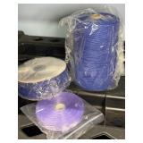 blue burlap ribbon, blue roll of cord, purple sati