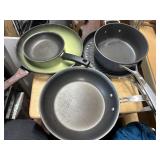 2 large skillets, small skillet, griddle large pan