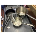 2 calphalon,kithcneaid pots, 2 smaller ones with
