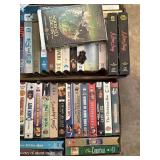 4 boxes of  vhs movies   garage