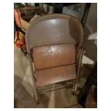 metal folding chair , wood seat   basement