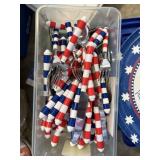 red, white and blue flatware, forks,spoons, knives