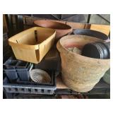 shelf of flower pots, trays, etc,  garage