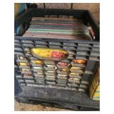 2 boxes ideal books & black milk crate  garage