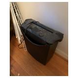 paper shreader, lot of curtain rods,2 organizers