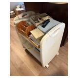 plastic rolling shelf, with office supplies,