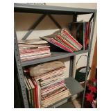 2 shelves of crafting books and magazines