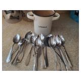 porcelain utensil pot, and a lot of serving spoons