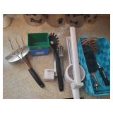 basket of kitchen utensils, ricer, meat claws,