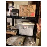 contents of shelf -  2 electric work lights, tote