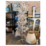 6ft tall creme colored tree with string lights