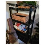black plastic 4 shelf unit , extra legs,