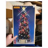LEMAX lighted spinning christmas tree   basement ;