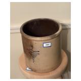 2 gallon crock , crack down front,