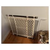 2 metal window guards and dog gate