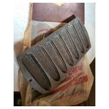 cast iron cornbread pan 7 holes,  basement