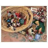 large basket of christmas decor, ornaments,