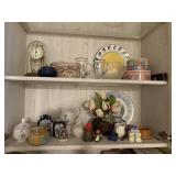 contents of cabinet - 2 plates, baskets, tins, pit