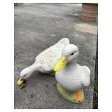 2 ceramic geese, cracks  16' x 19'   back yard