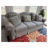 sofa w/ 5 throw pillows   back porch