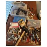 tray of tools, padlocks, plate display, tire