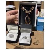 2 size 8 rings, earring/necklace set, gold tone