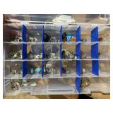 organizer with 1 necklace and multiple earrings