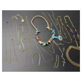 costume jewelry 16 necklaces,3 bracelets, 1 cross
