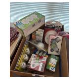 box of light bulbs with a smoke detector